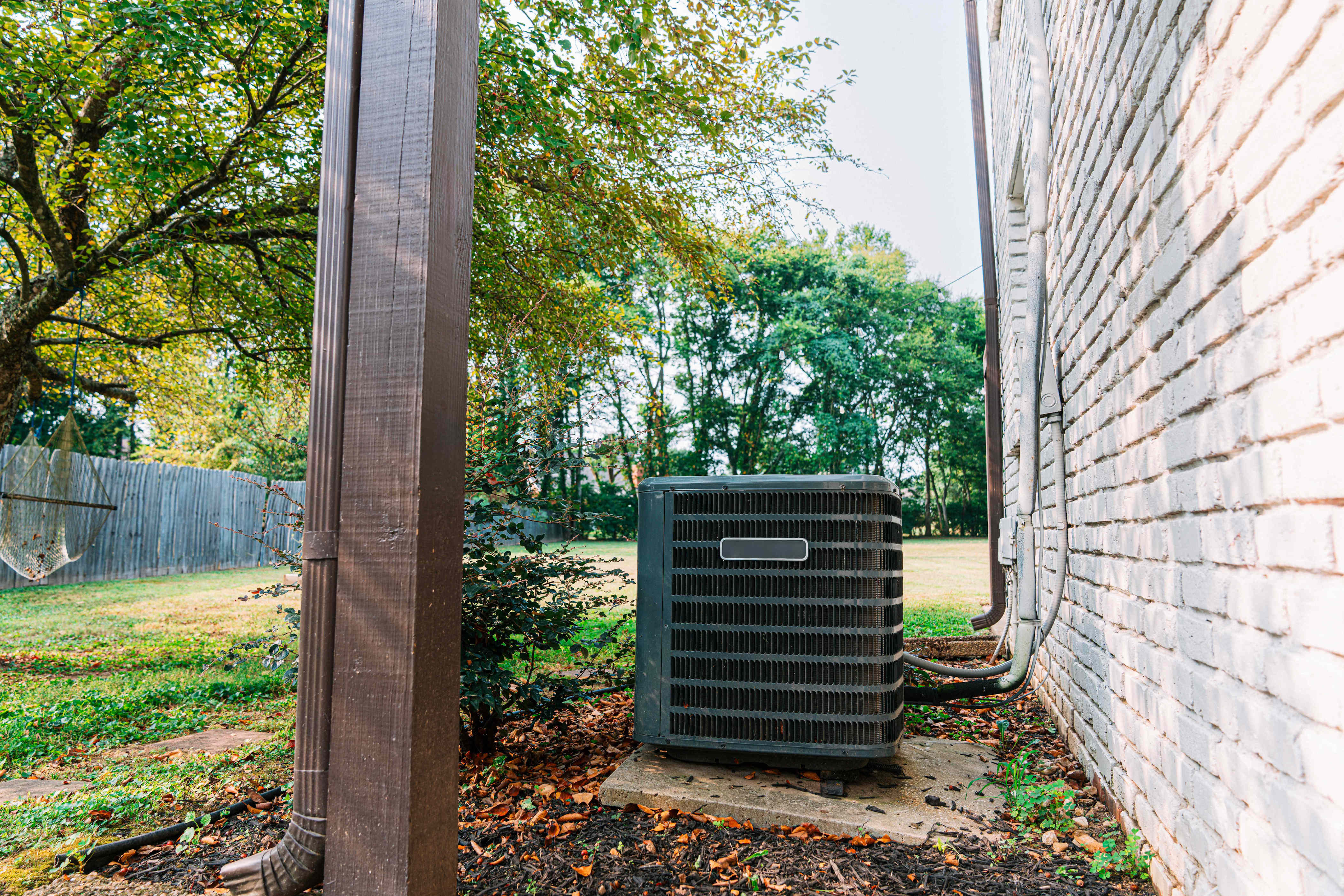 Does adding a shade over your air conditioner help cool your house ...