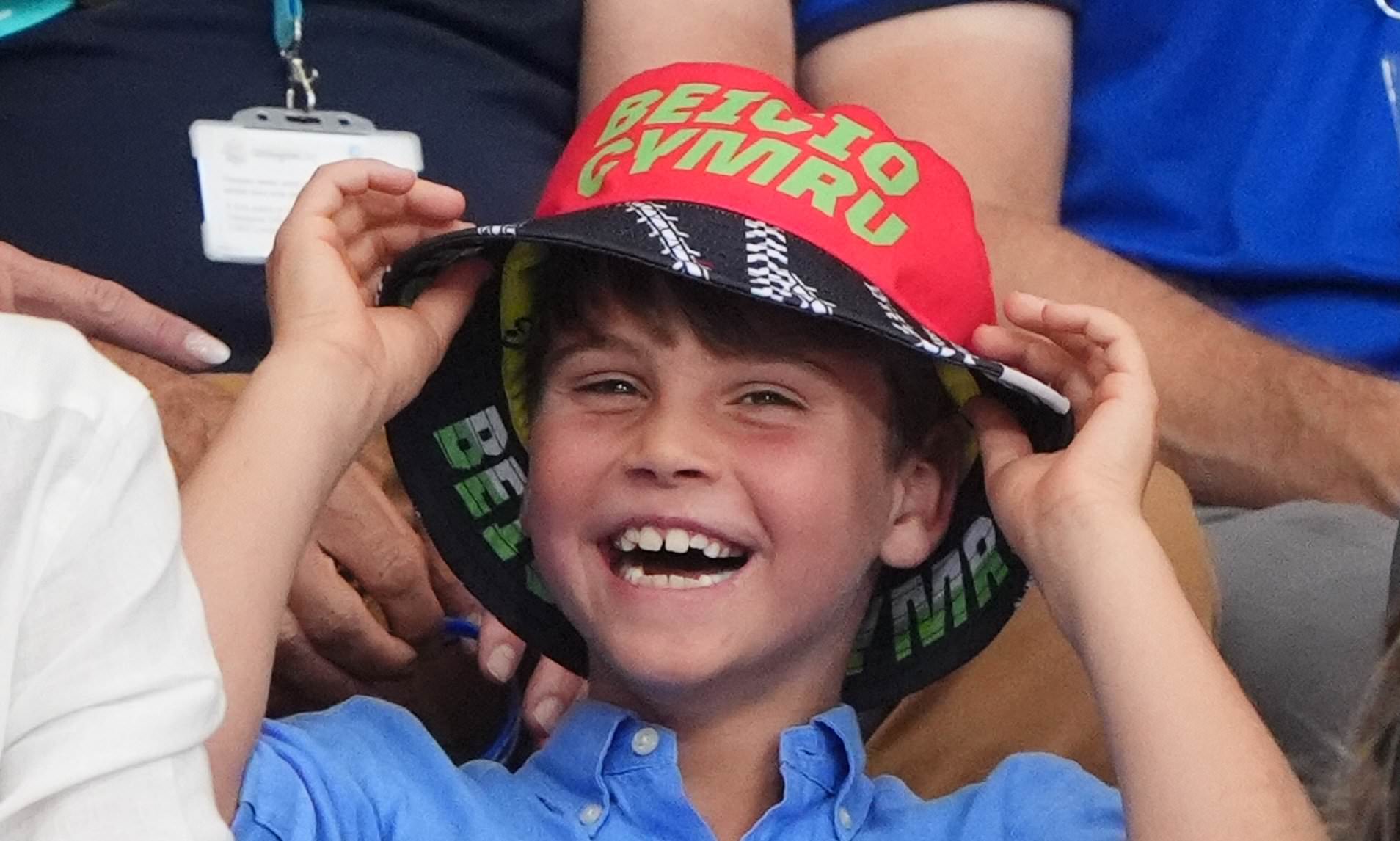 Giggling Prince Louis charms fans as he sports bucket hat while watching Commonwealth Games