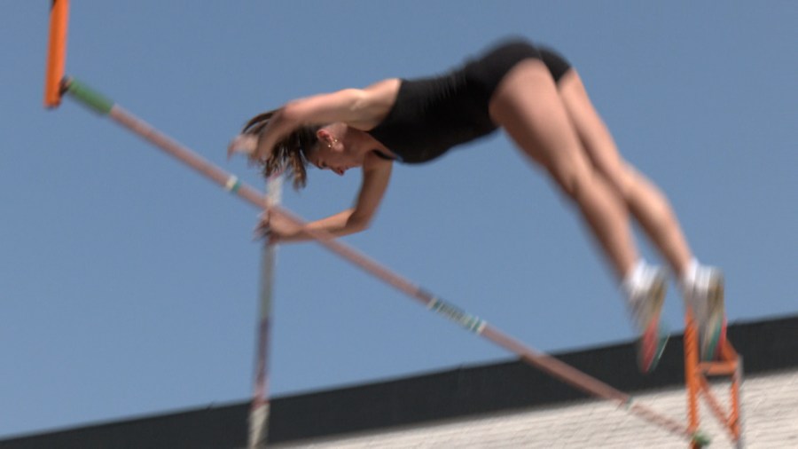Pole vaulters take over the street in downtown Bismarck for exhibition