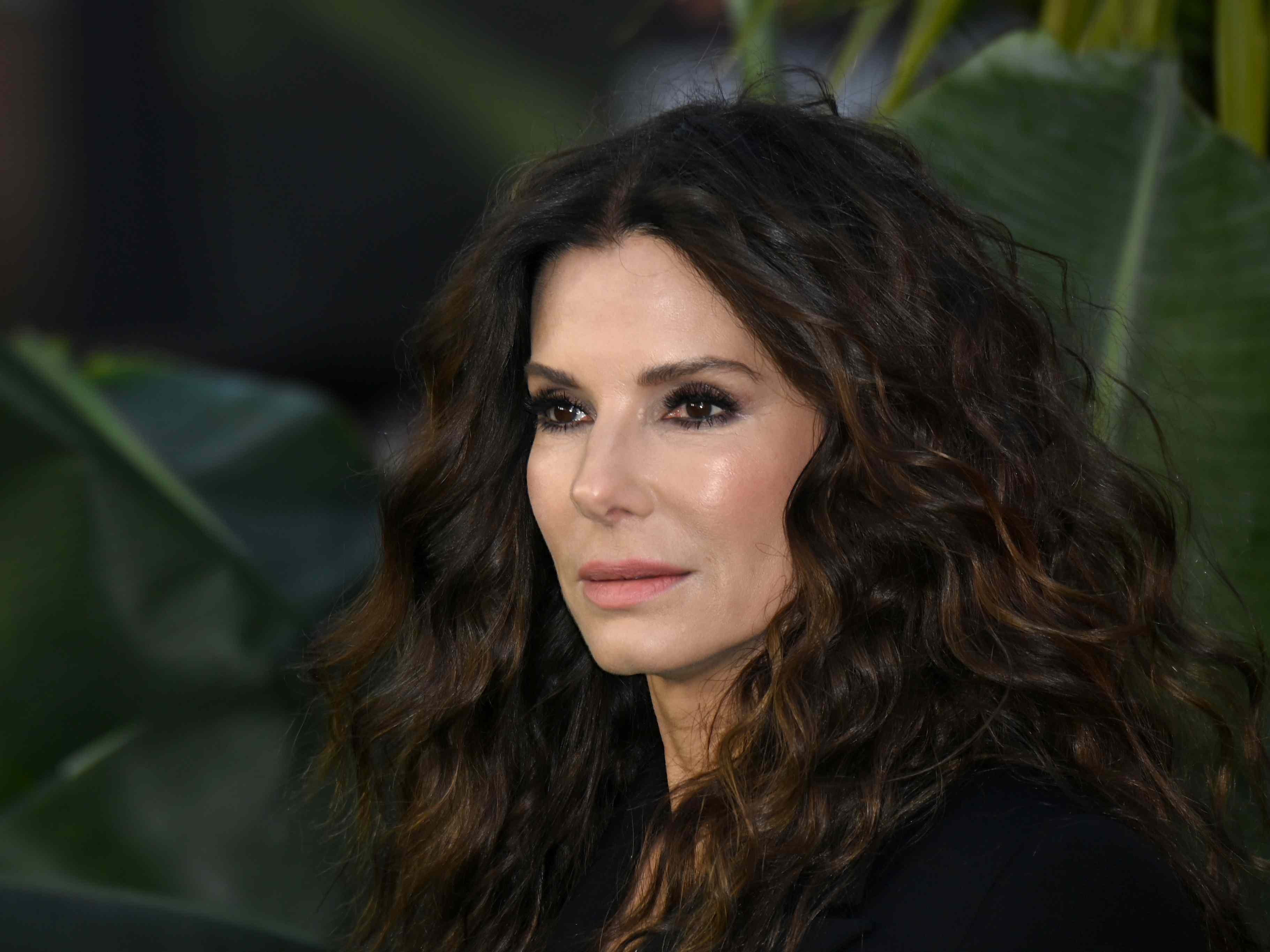 Sandra Bullock shares never-before-seen photos with lookalike sister Gigi