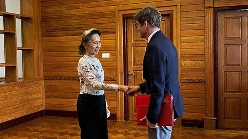 Aung San Suu Kyi meets Red Cross official after mounting demands the military prove she is still alive