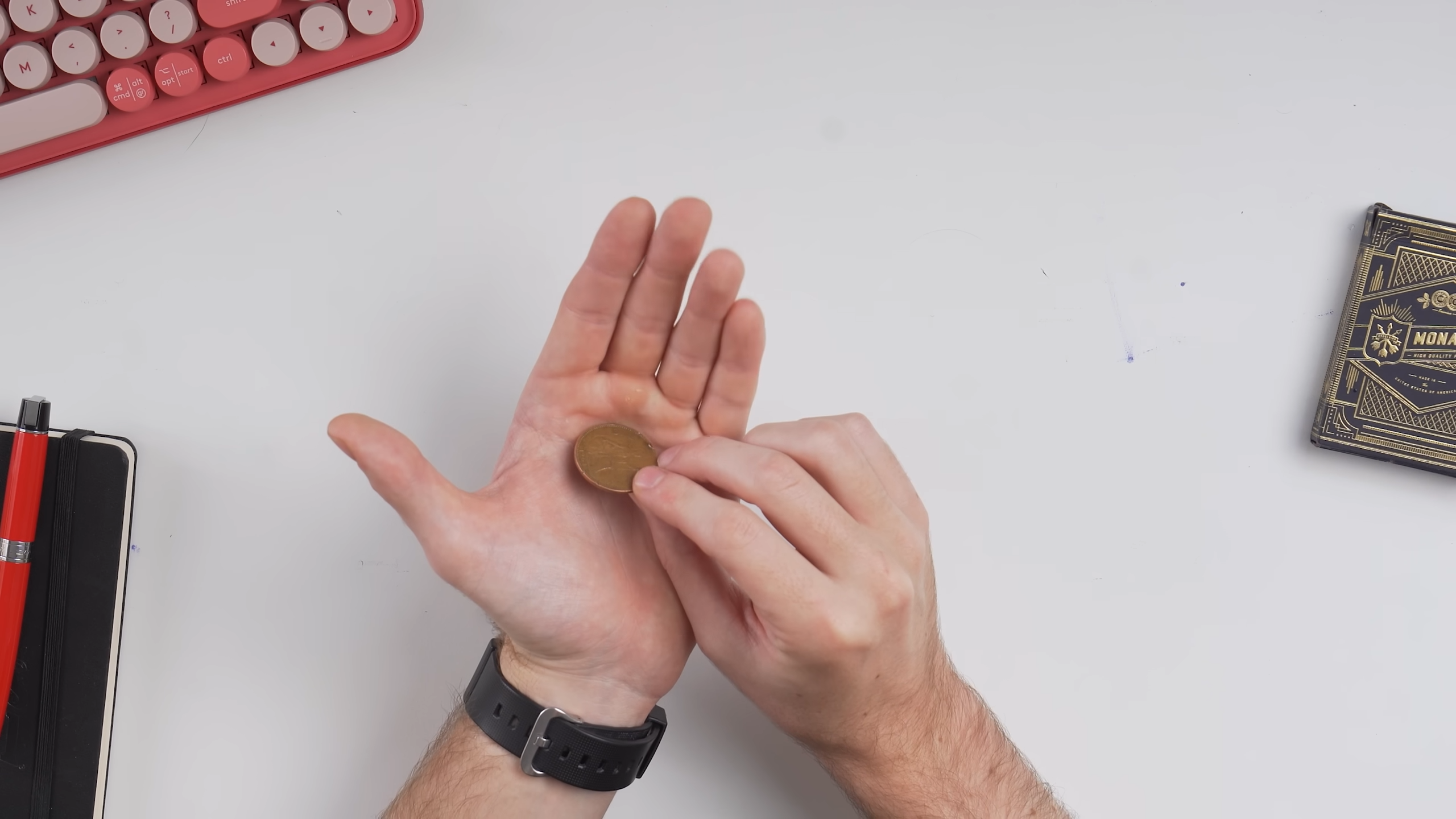 The coin landed in his hand, then disappeared like it was never there