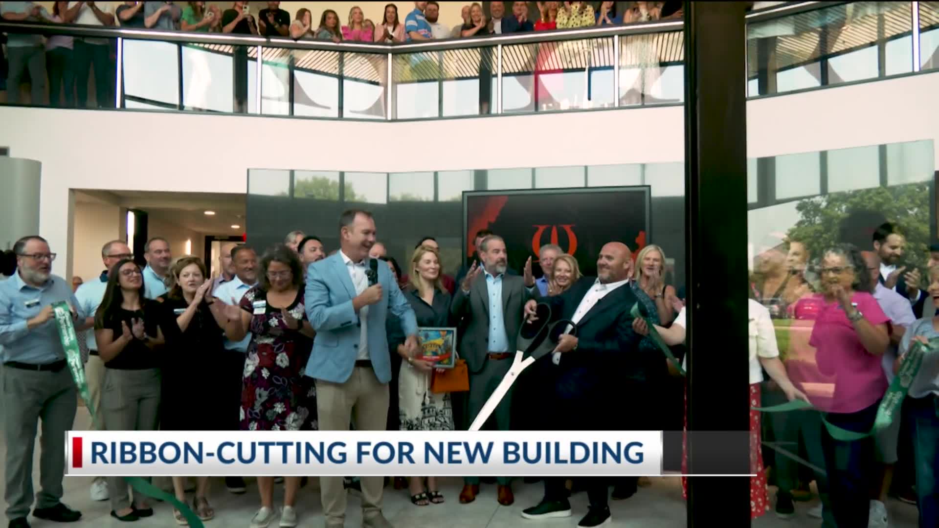 Magellan Fiancial ribbon cutting ceremony reveals new office building