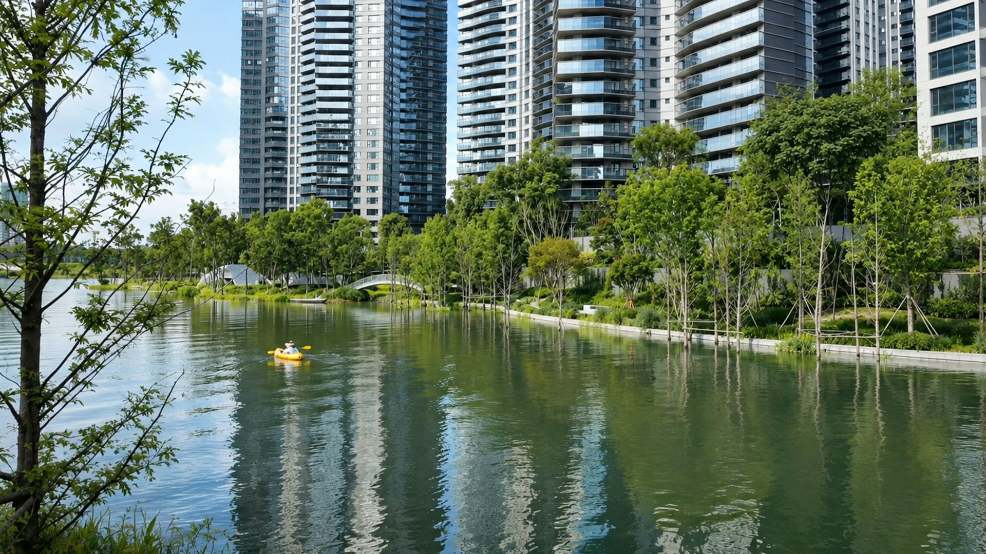 Modern residential skyline frames calm urban lake and lush garden landscape