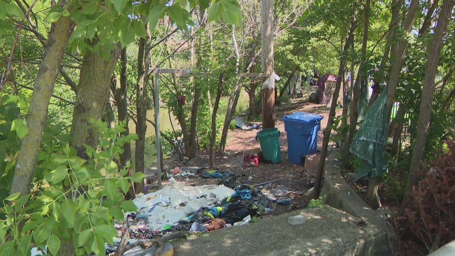 NW side residents battle growing trash from tent encampment