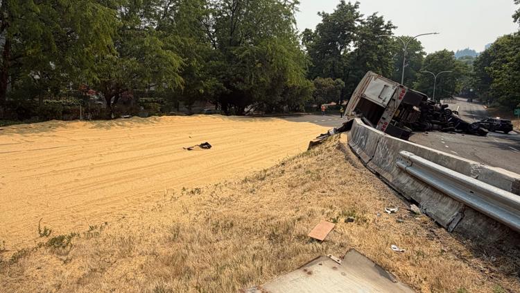 South Harbor Drive reopened at Naito after crews clear overturned semi and spilled grain
