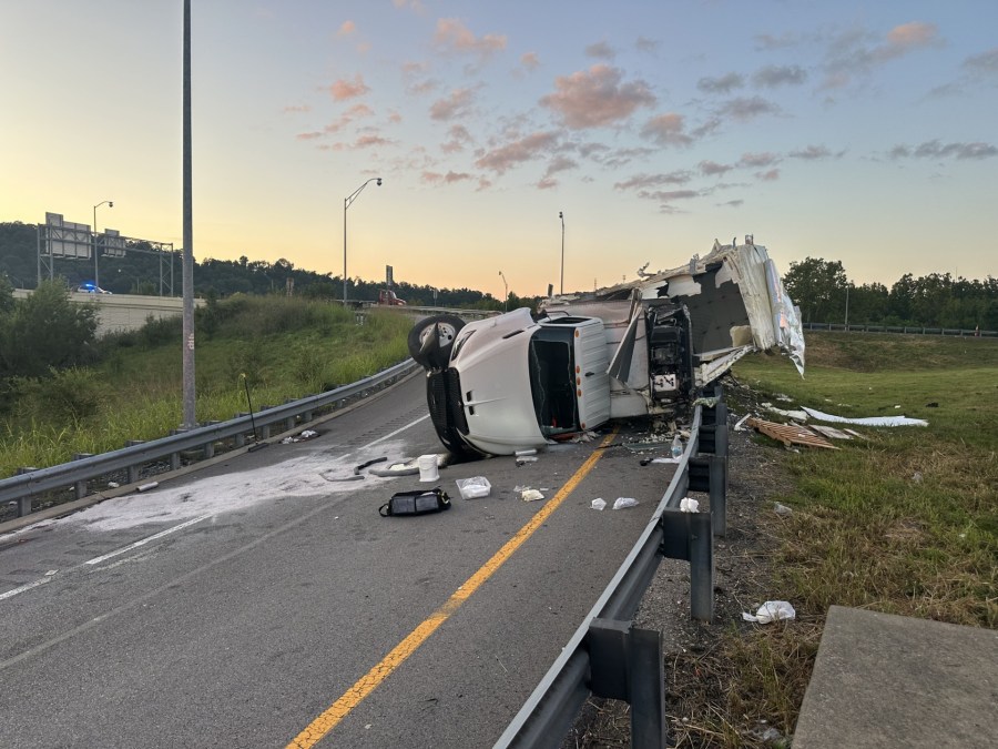 Driver transported after tractor-trailer rollover on I-64