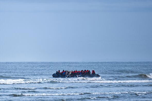Migrants in boat of French coast