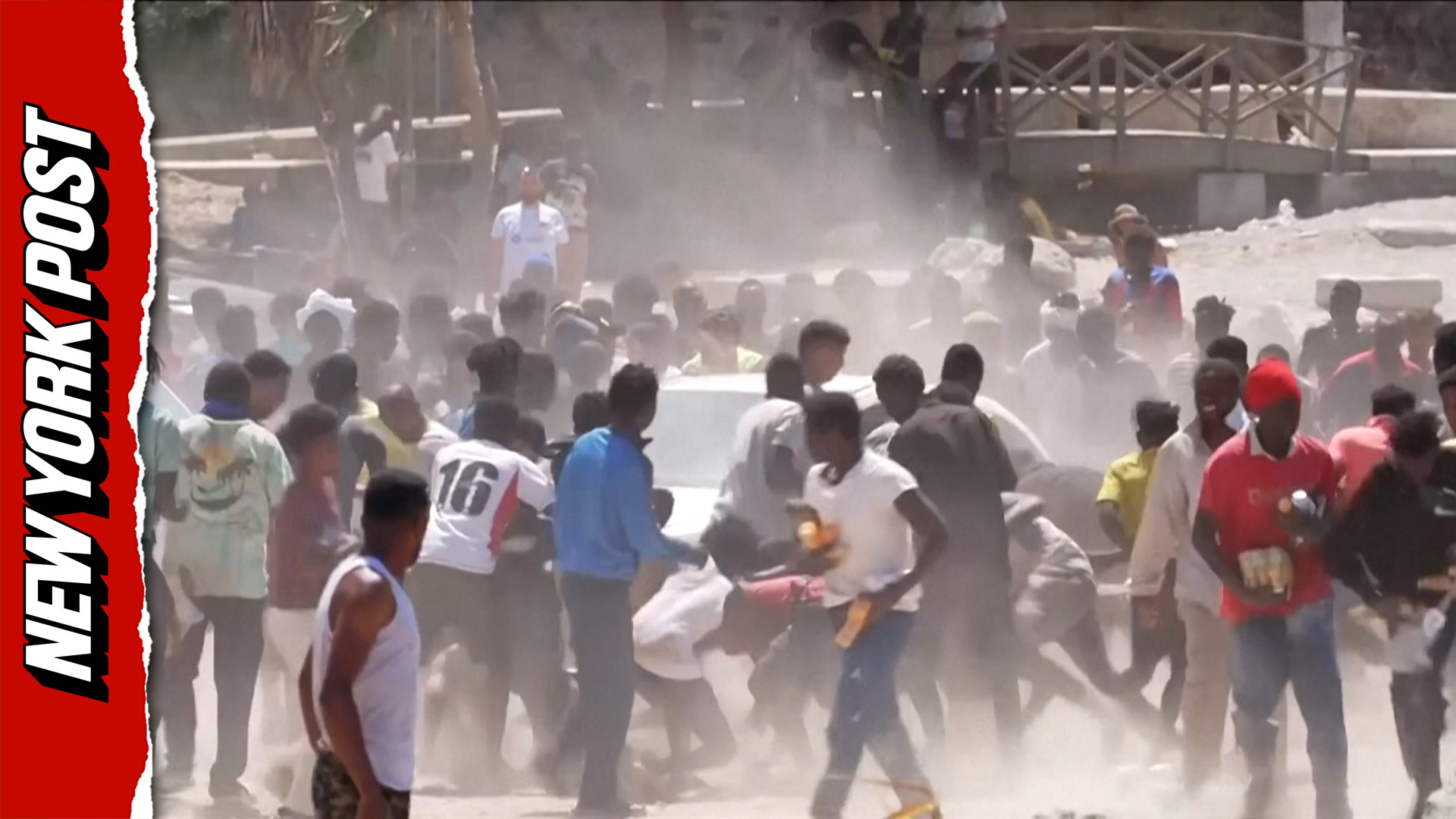 Chaotic scenes show migrants rush for supplies in Ceuta