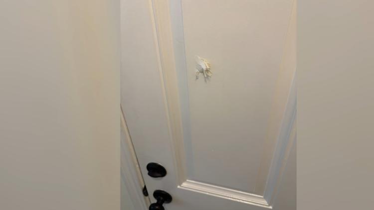 'I'm glad we weren't home' | Neighbors find bullet holes in door after Westside shooting injures four
