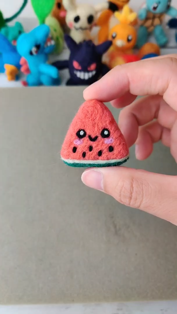 ASMR watermelon wool art created with needle felting