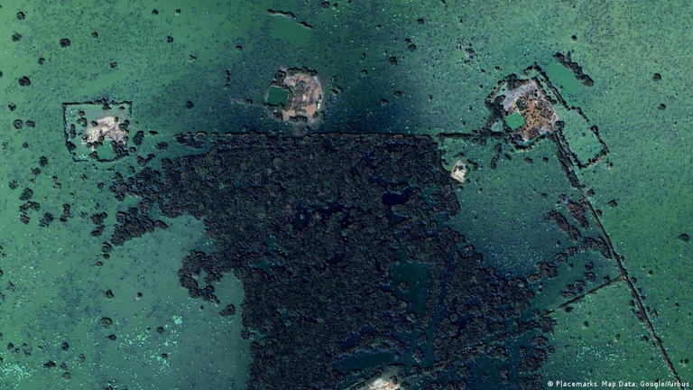 Satellite images show the ongoing devastation of the 2021 floods, with oil wells remaining under water for years