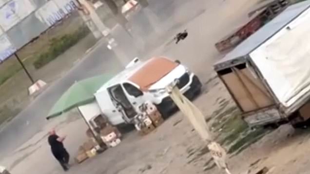 Russian drone toys with fruit seller before striking in 'human safari' on civilians