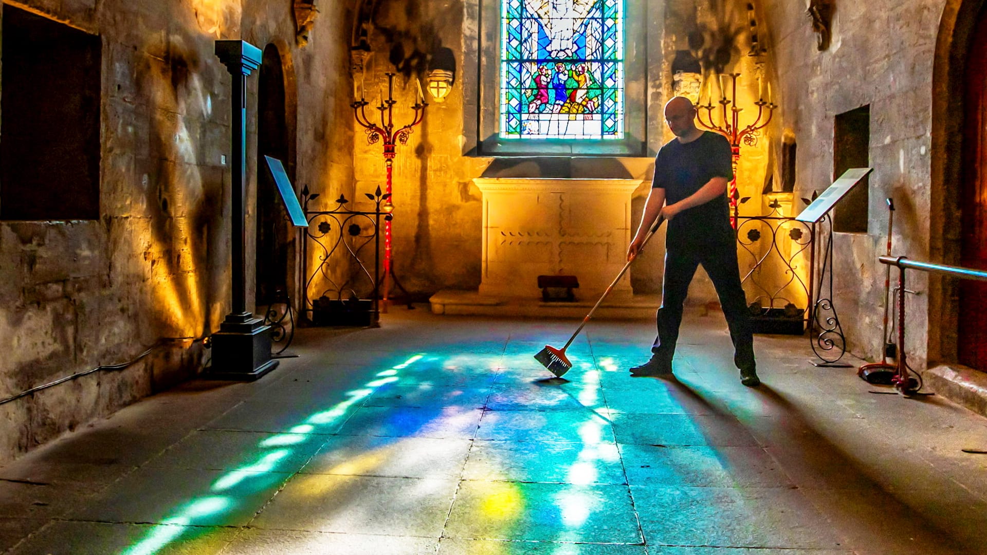 Light shines through stained glass window at DaVinci Code crypt
