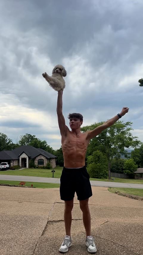 Dog performs synchronized cheerleading routine