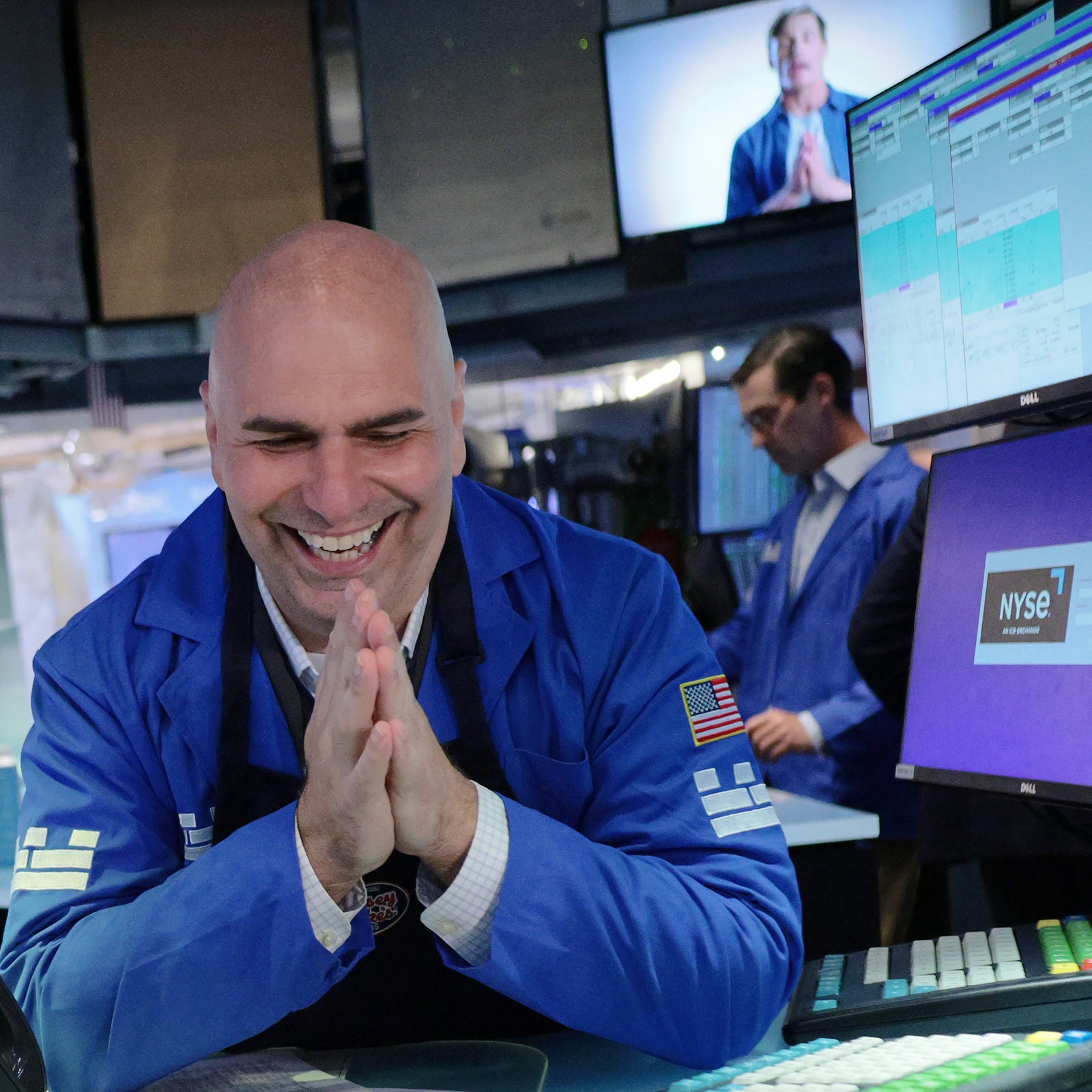 Dow soars 1,000 points on strong corporate profits, hopes of Iran deal