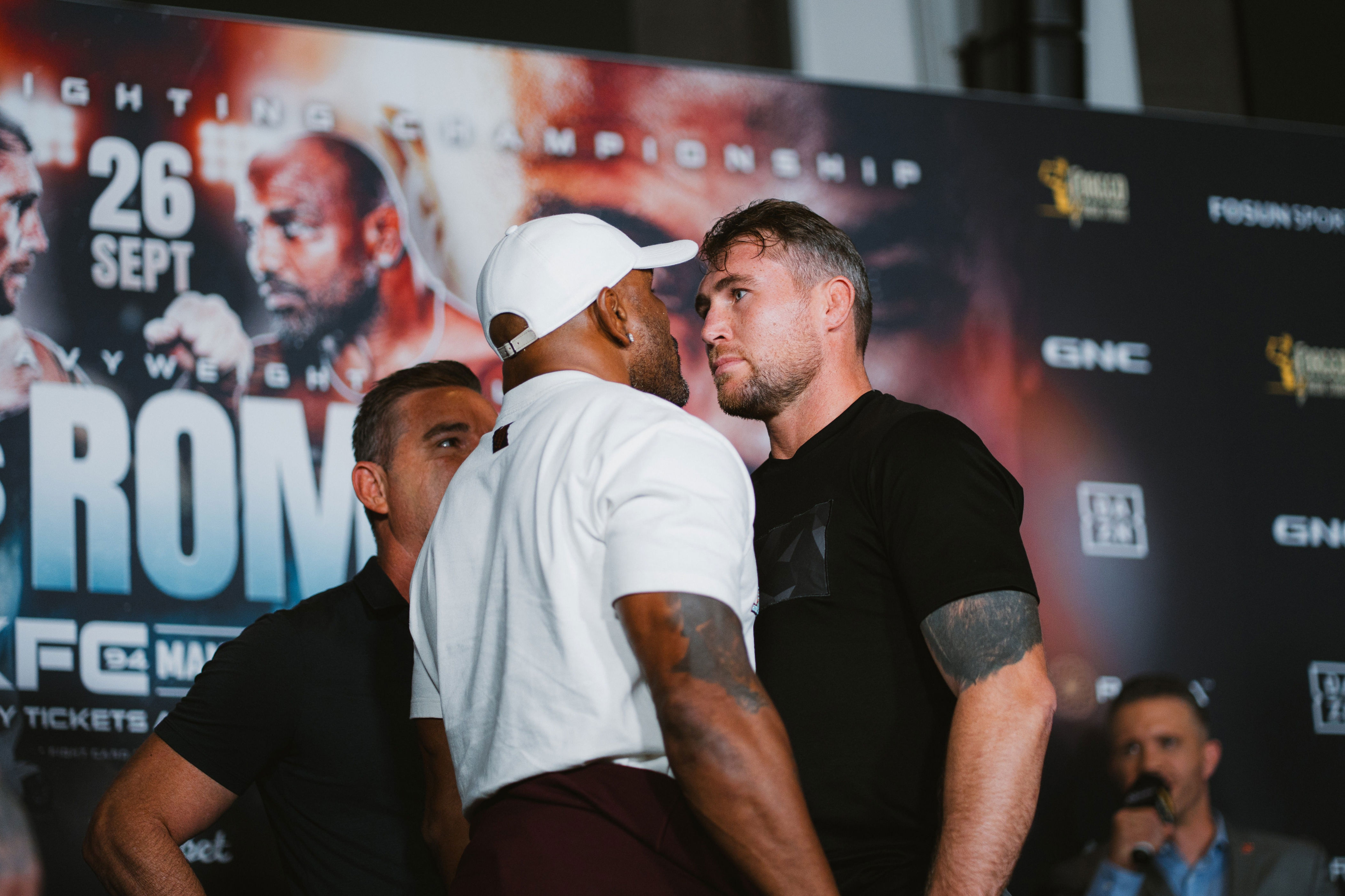 Darren Till (right) and Yoel Romero refused to unlock eyes in a stare-down that lasted over 200 seconds (BKFC)