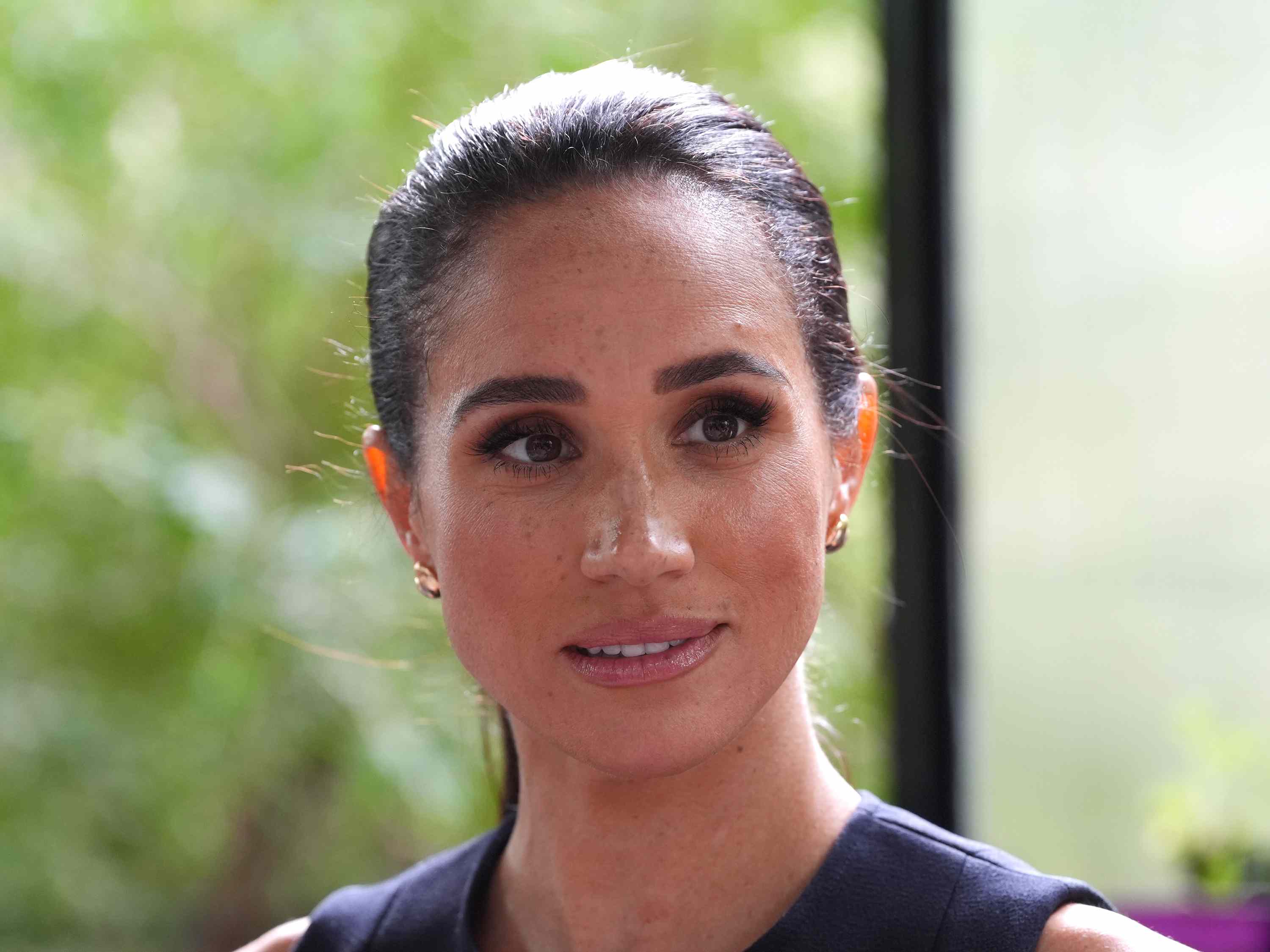 Meghan Markle breaks from her signature minimalist style with a bold ...