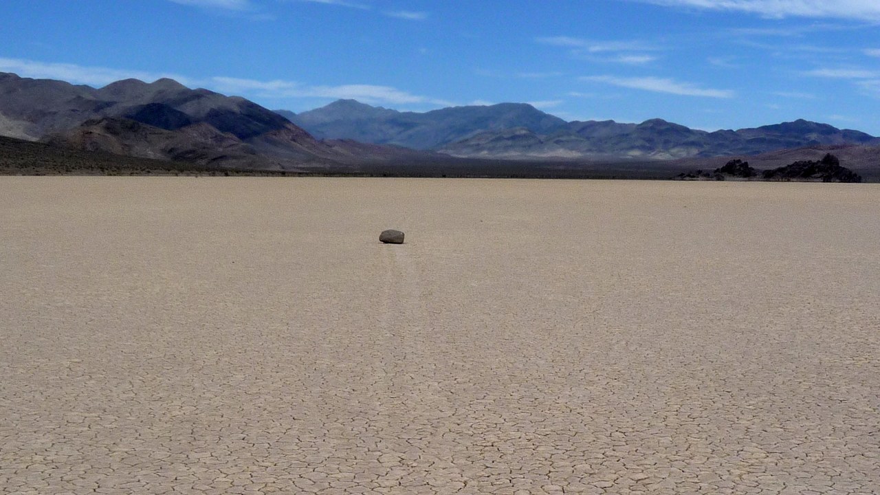 Rocks slide across a Death Valley lakebed and leave trails no one sees ...