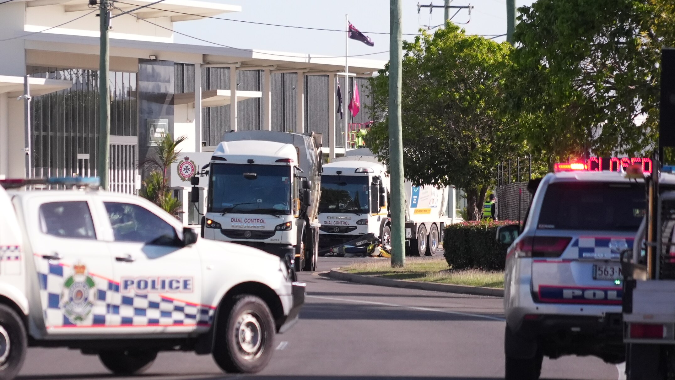 Motorcyclist dies after collision with Townsville City Council garbage truck