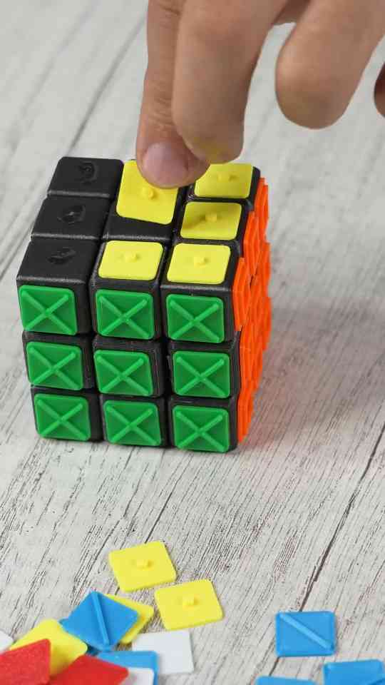 3D printed Rubik’s cube compared to a real one