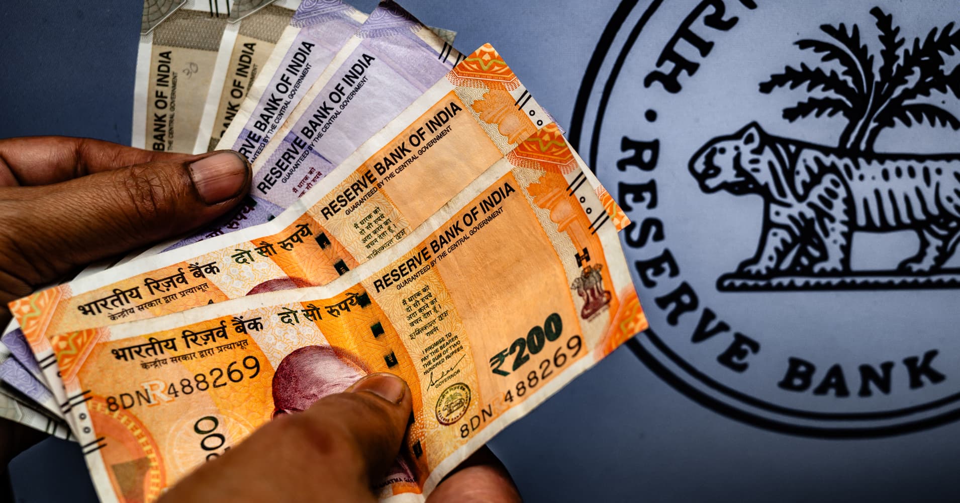 India's central bank keeps benchmark rates steady, cites 'moderate ...