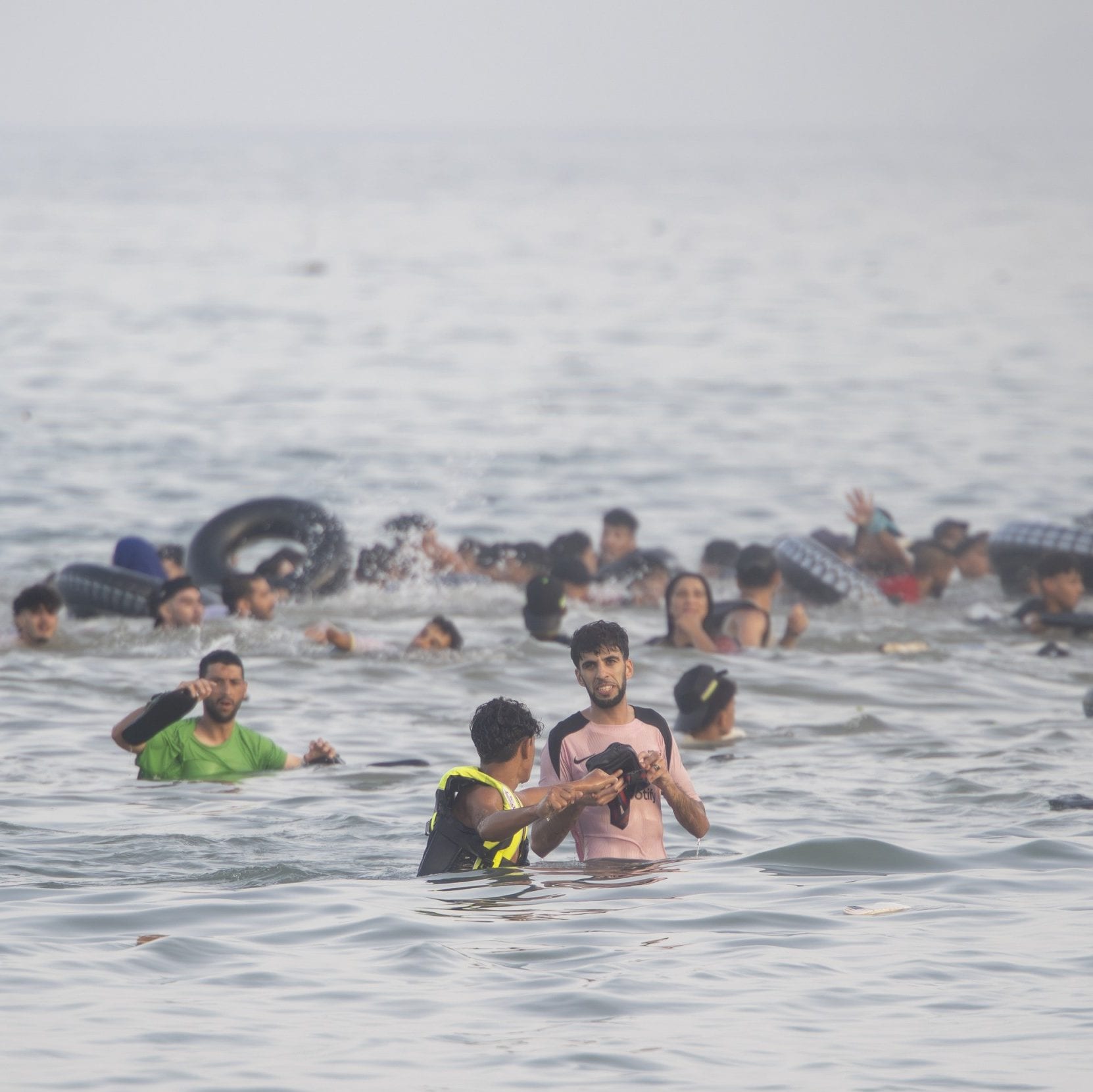 At least 77 people died as thousands of migrants swam from Morocco to Ceuta last week - Getty
