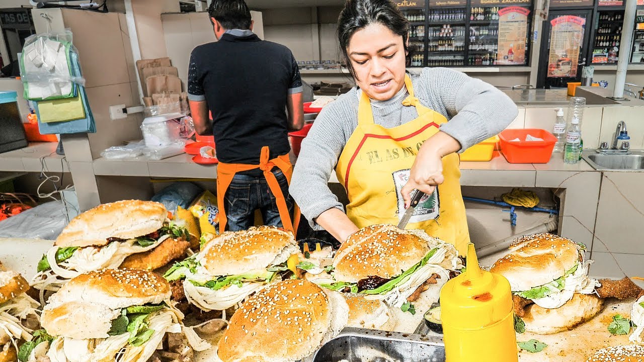 You can't even follow his hands... watch how Mexico's fastest sandwich ...