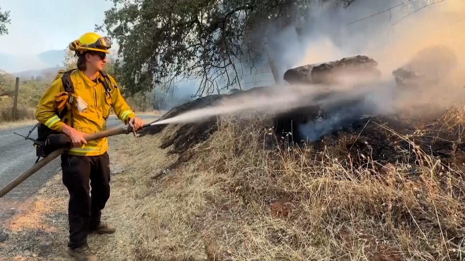 Firefighters battle fast-growing wildfire near Angels Camp, California