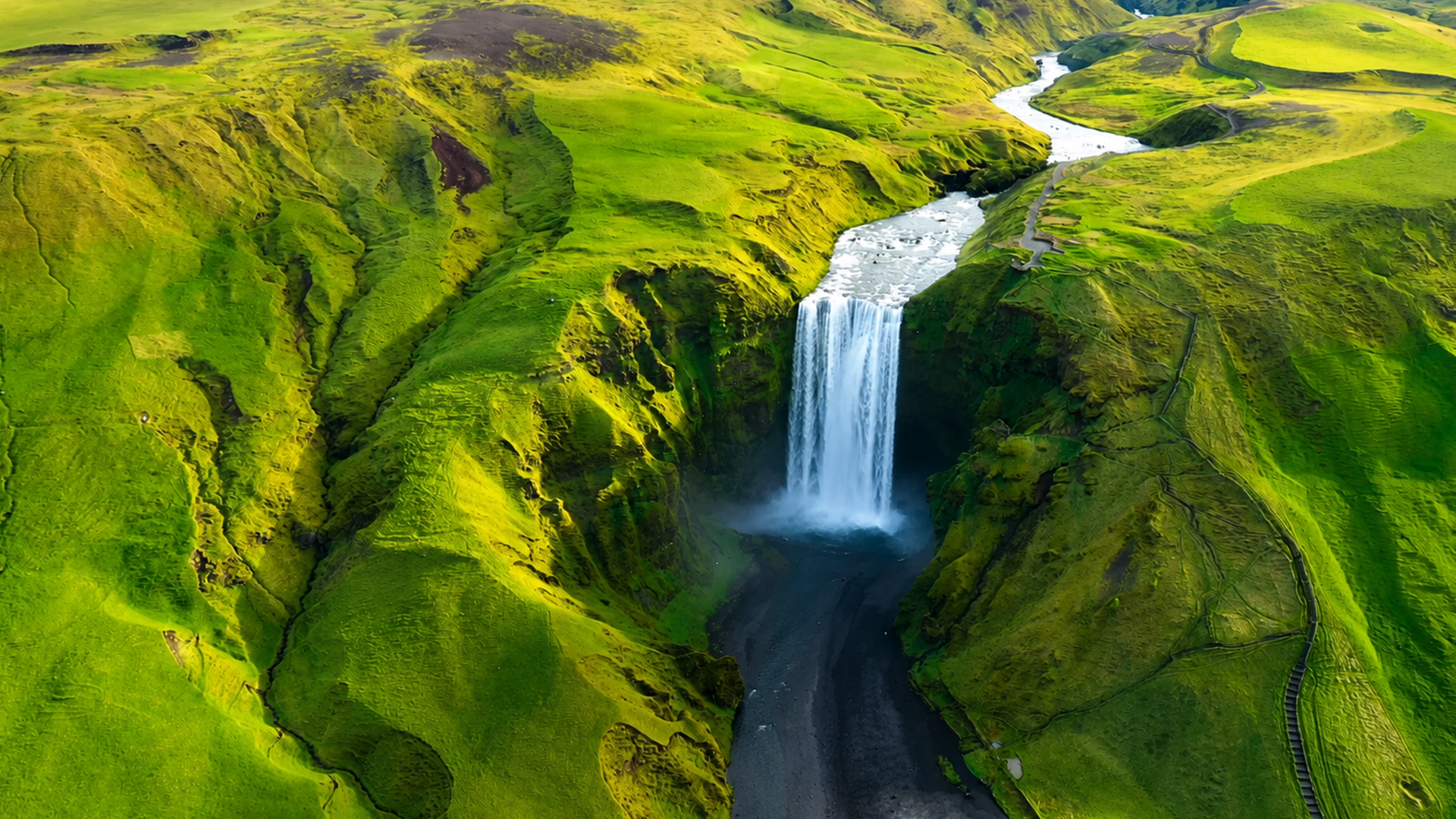 What carved this deep canyon in Iceland?