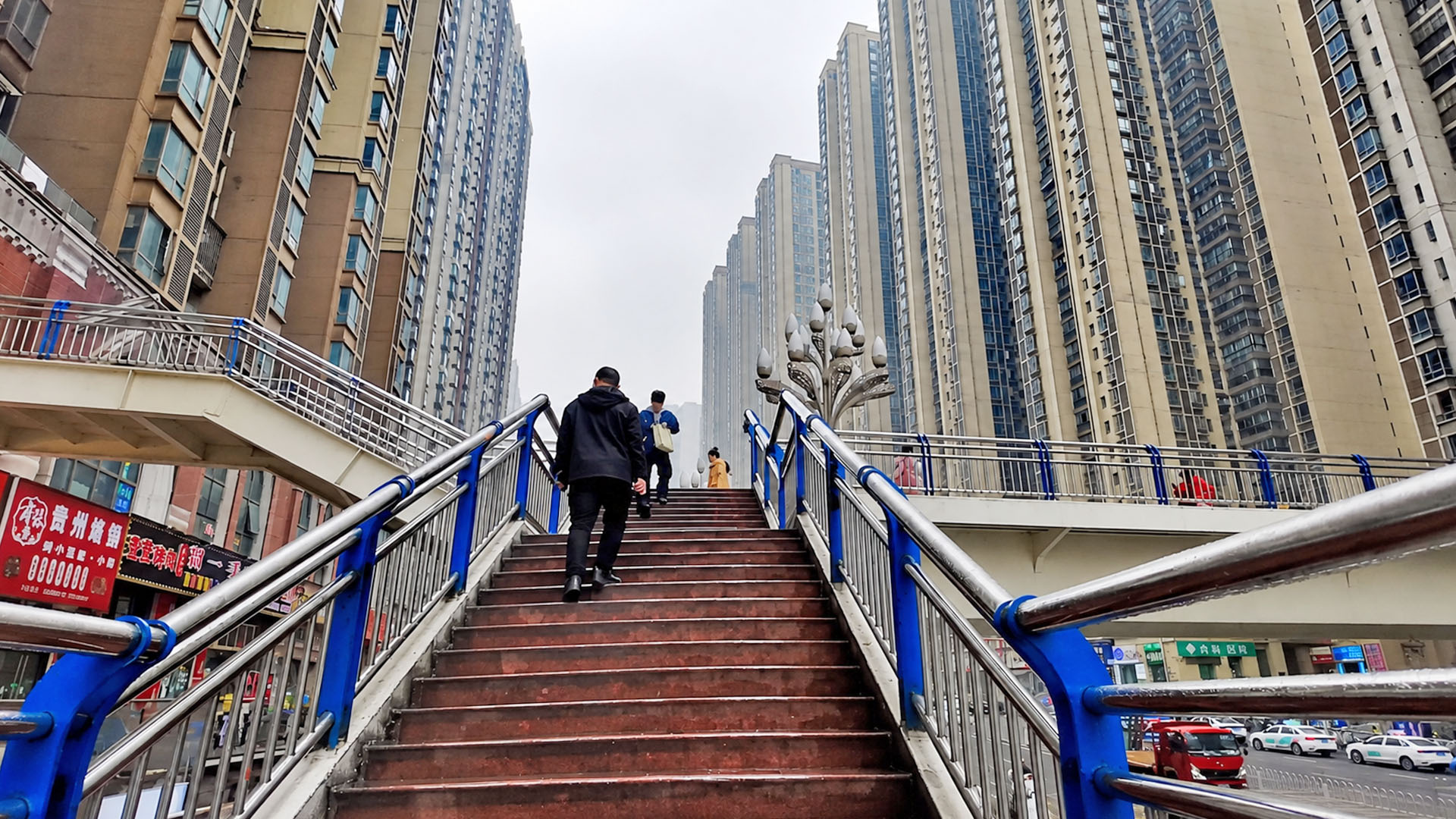 China's high-rise apartments surround a multi-level urban crossing