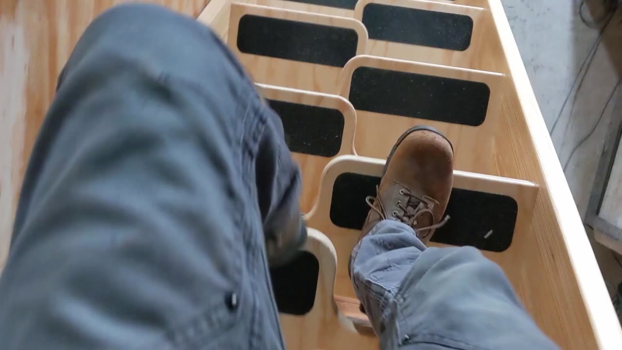 A compact alternating staircase unlocks years of hidden storage