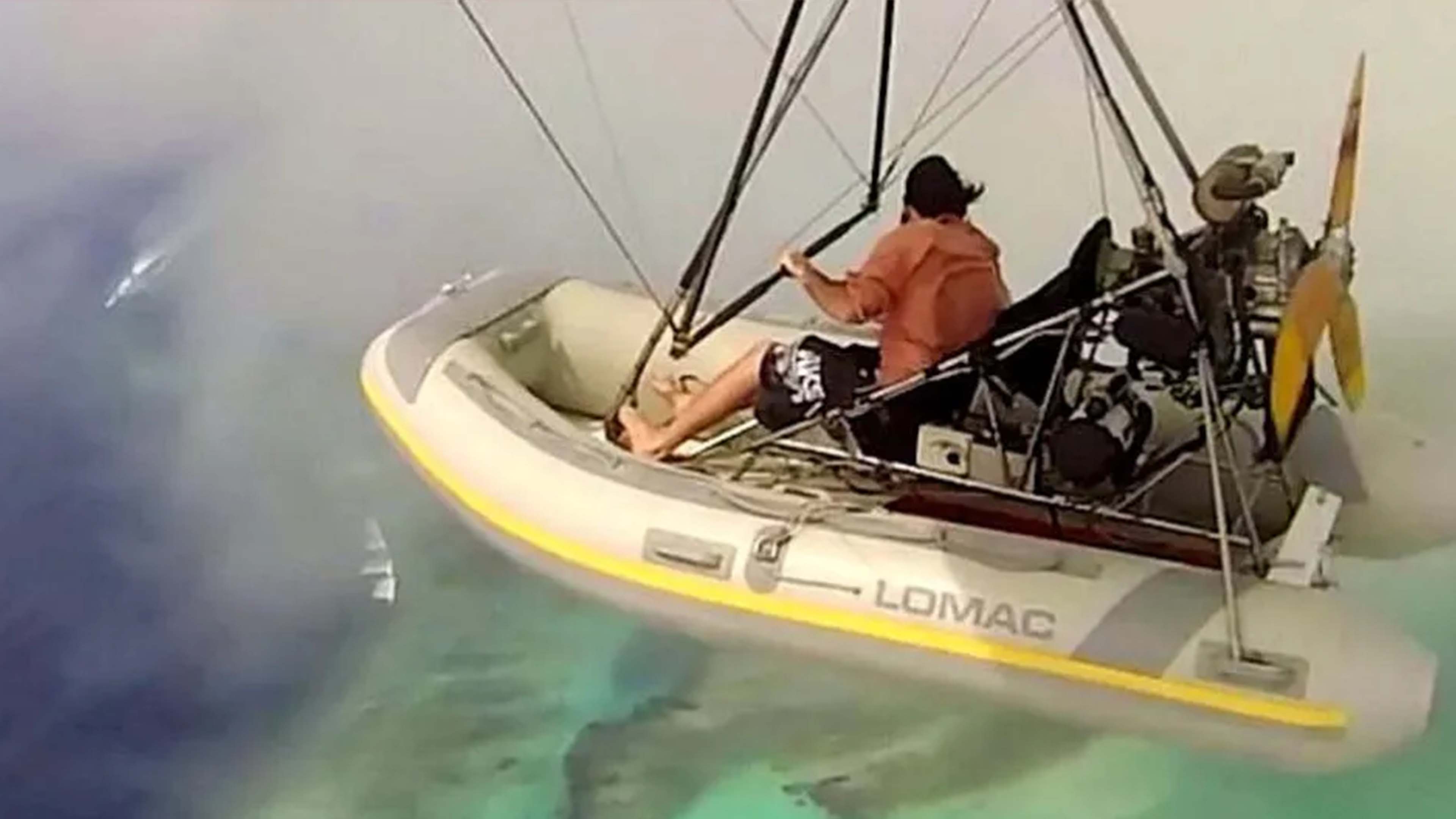 Aussie man pilots hand-built flying boat to get the perfect snaps