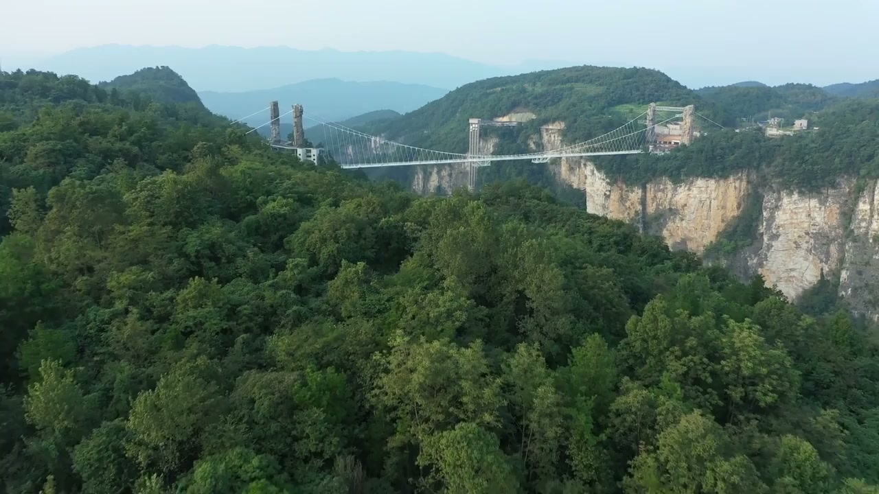 Zhangjiajie glass bridge, China: Drone glides over canyon