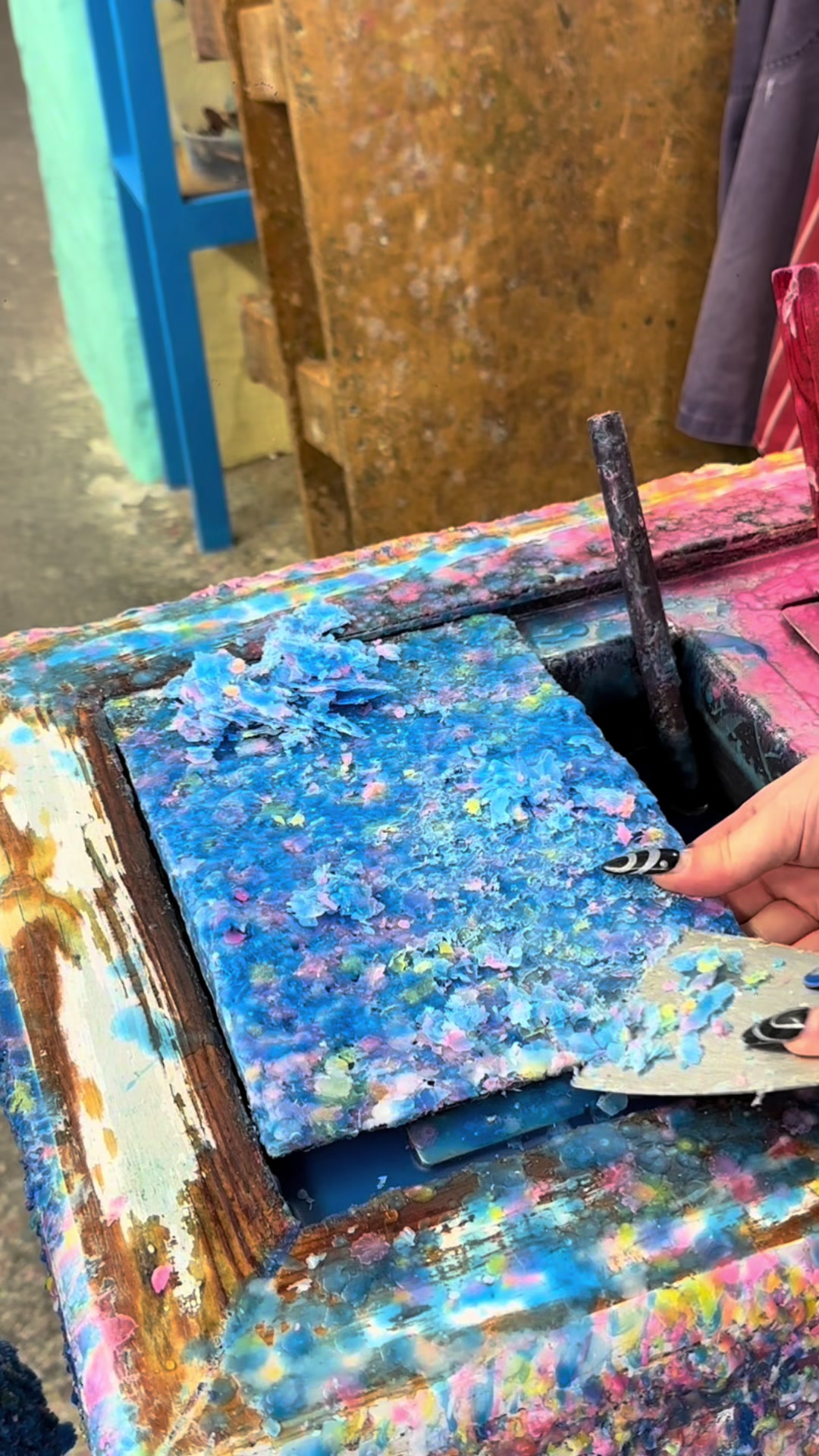 The satisfying process of wax scraping
