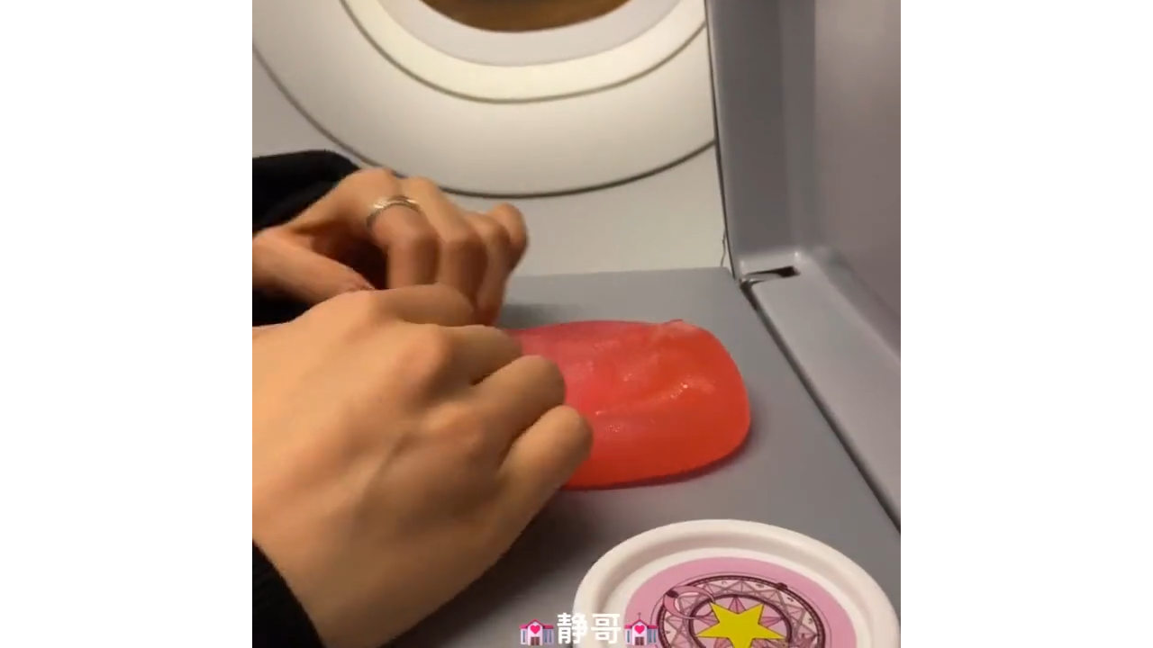 Poking soft red clay for satisfying dimples