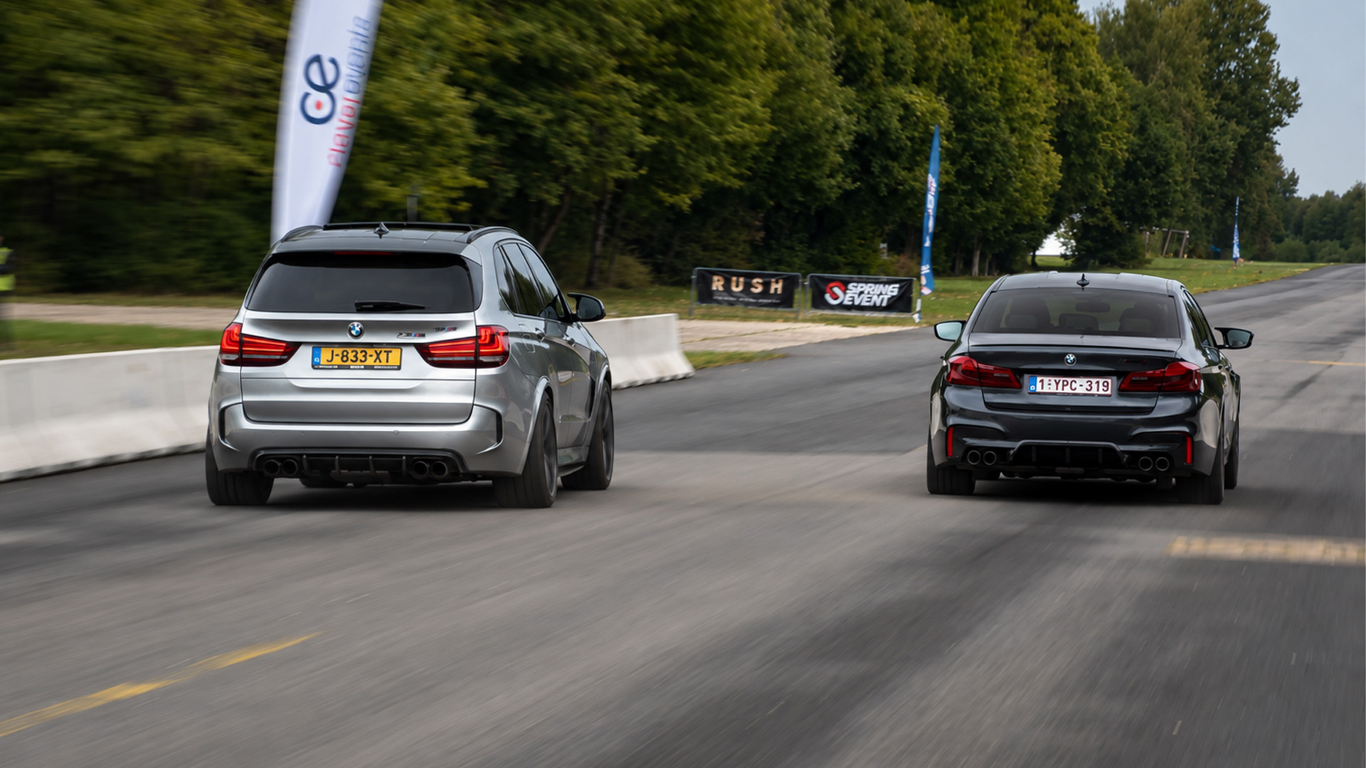 BMW X5 M battles BMW M5 in drag race