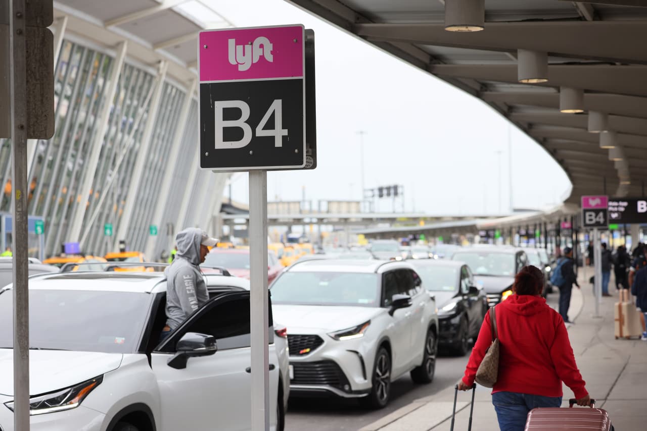 Lyft shares rise as it notches ridership growth