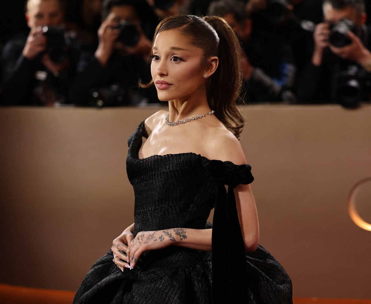 Ariana Grande will step back when her tour ends—avoiding a potential financial loss