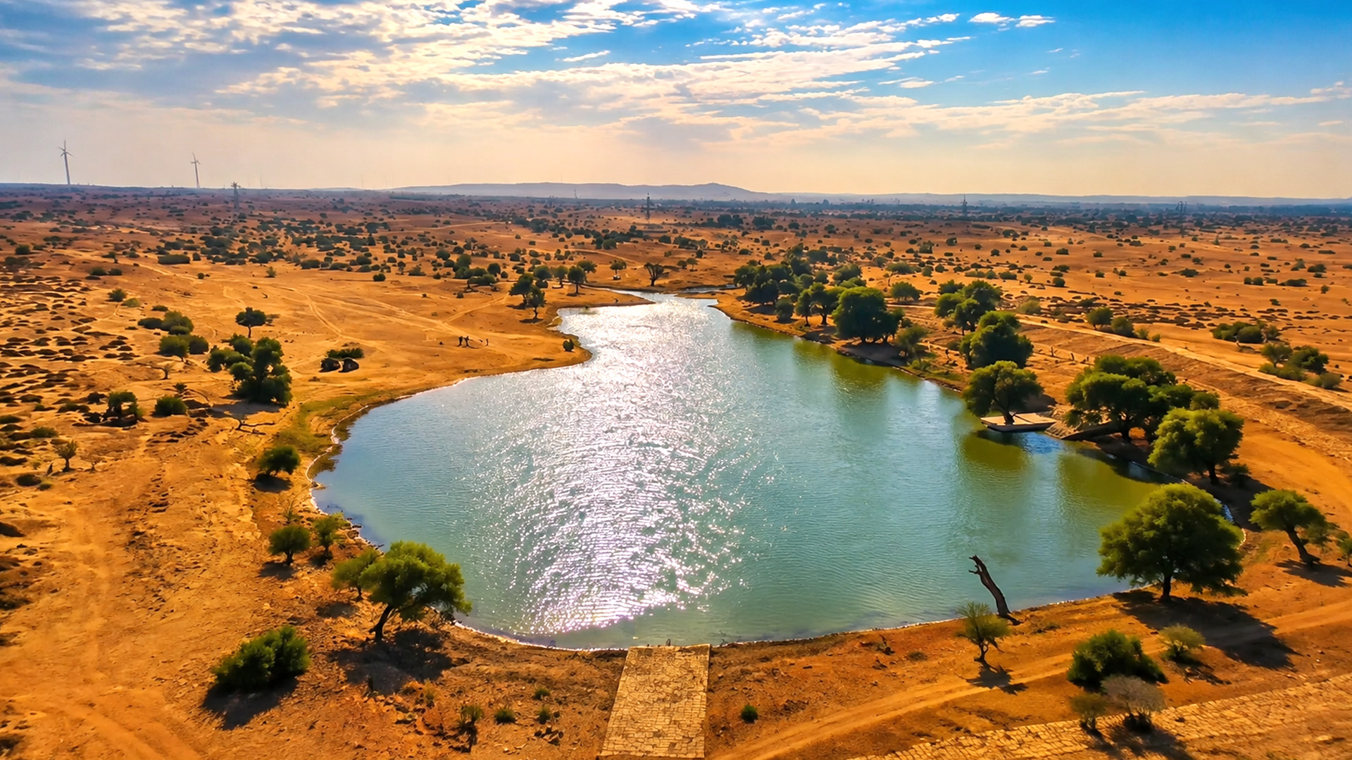 the-desert-oasis-surrounded-by-endless-golden-sand