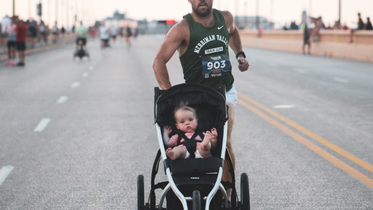 Image for He put his 1-year-old daughter in a stroller for a race; 4 minutes later, they may have made history