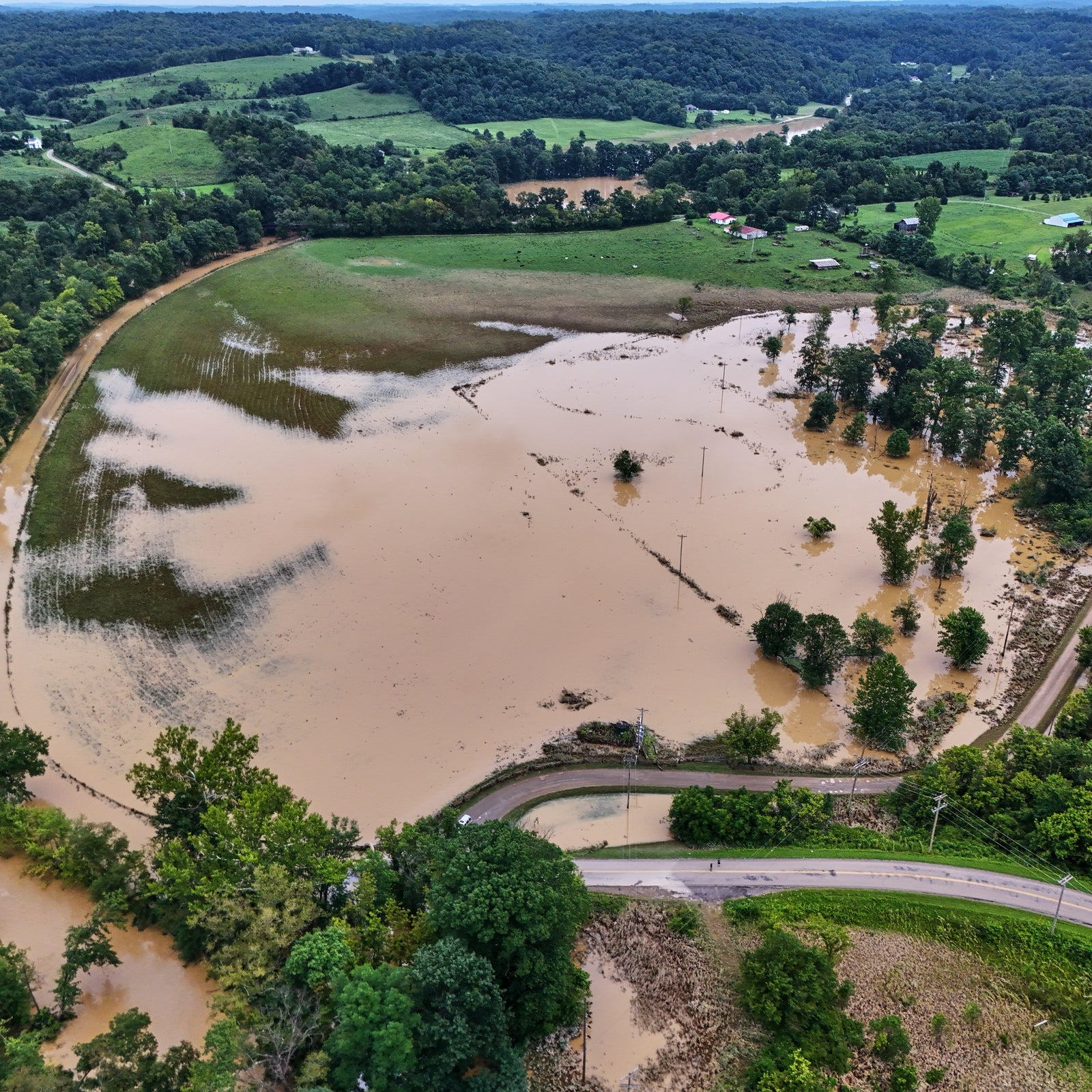 Floodwaters submerge Midwest neighborhoods bracing for more severe storms