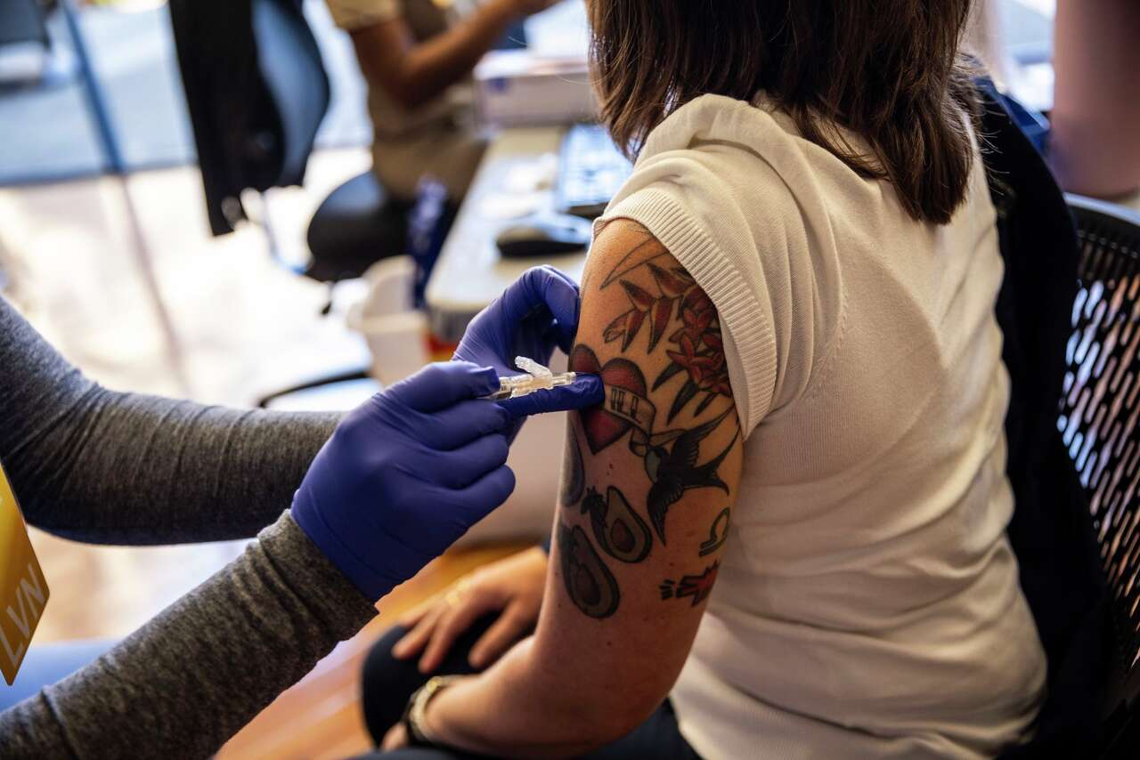 COVID is surging in California. Should you get vaccinated now or wait ...