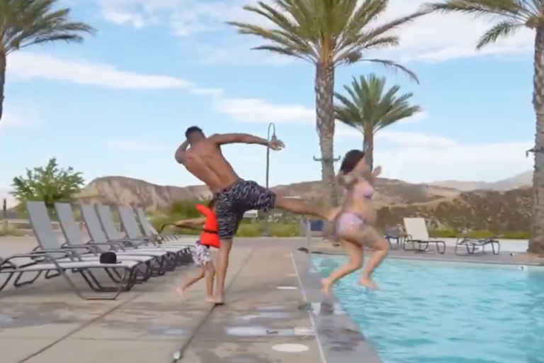 Rapper Blueface slammed online for kicking pregnant girlfriend into pool