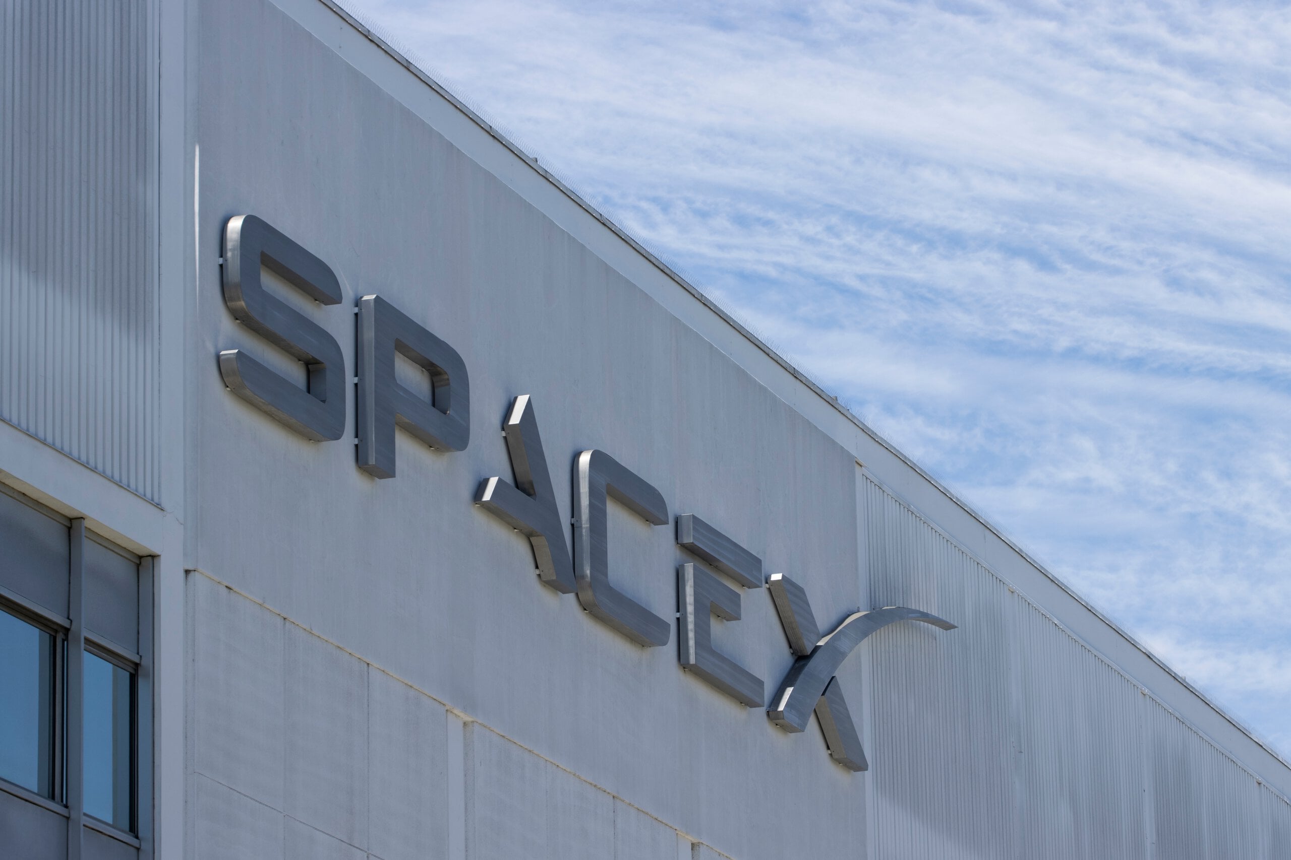 SpaceX slides again Friday but still holds most of a big weekly gain