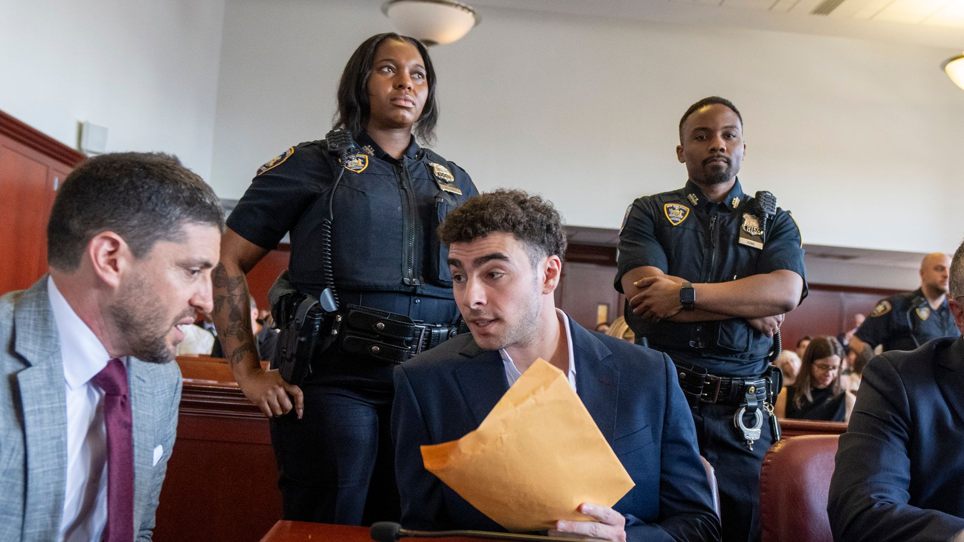 Luigi Mangione enters guilty plea on two federal counts in ...