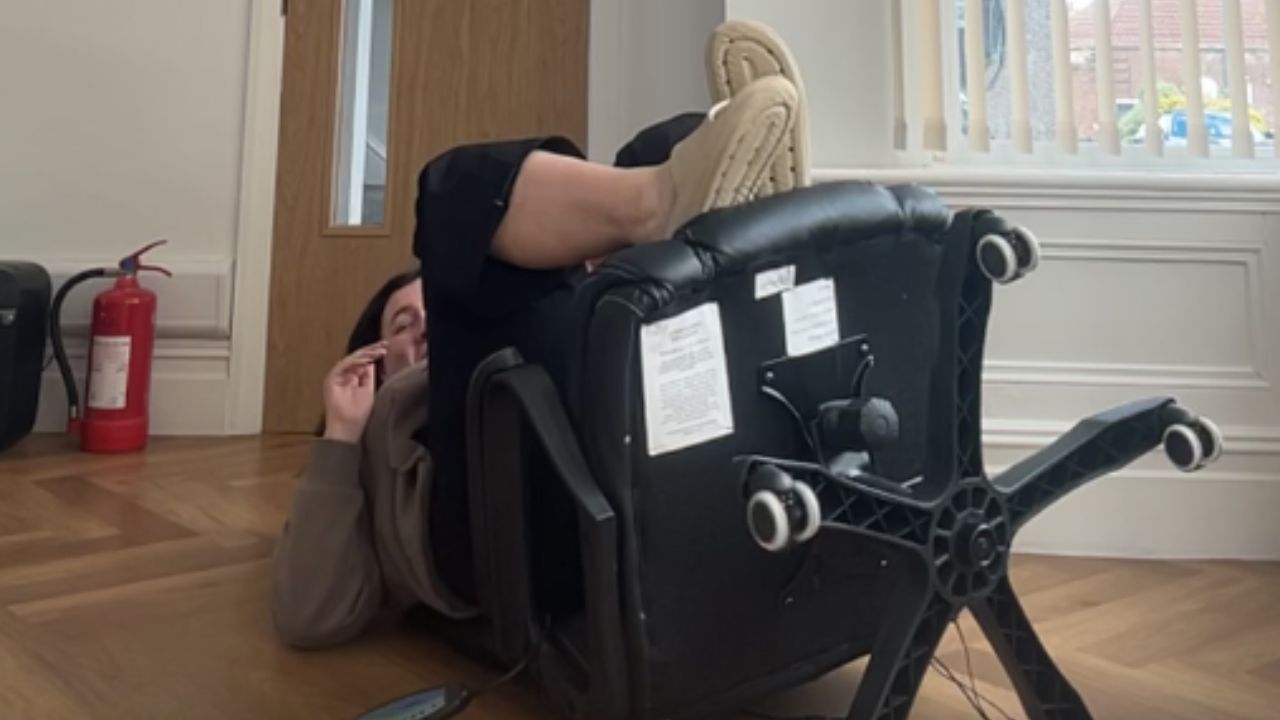 Girl's attempt to test chair strength ends in hilarious fall