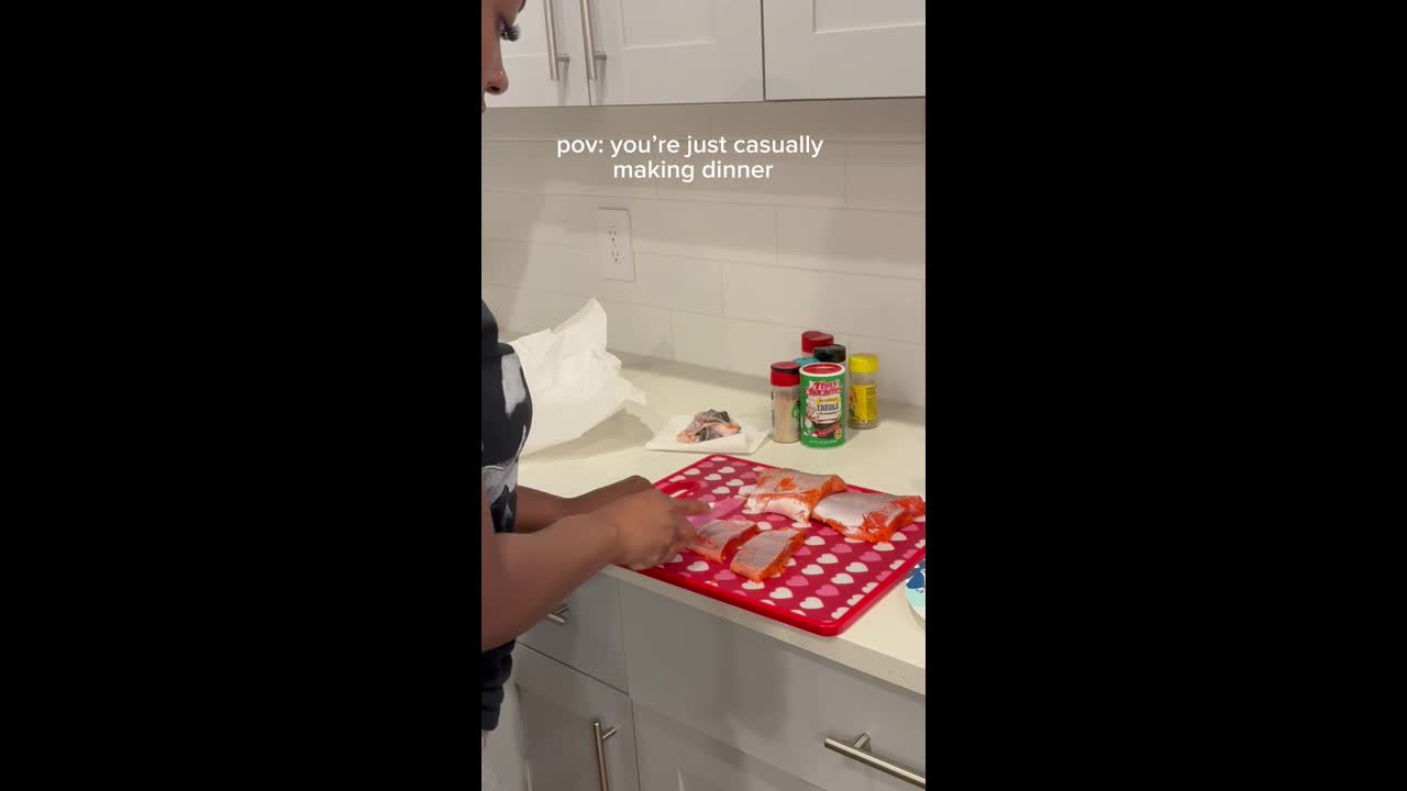 Woman shocked after worm crawls out of salmon while cooking at home in ...
