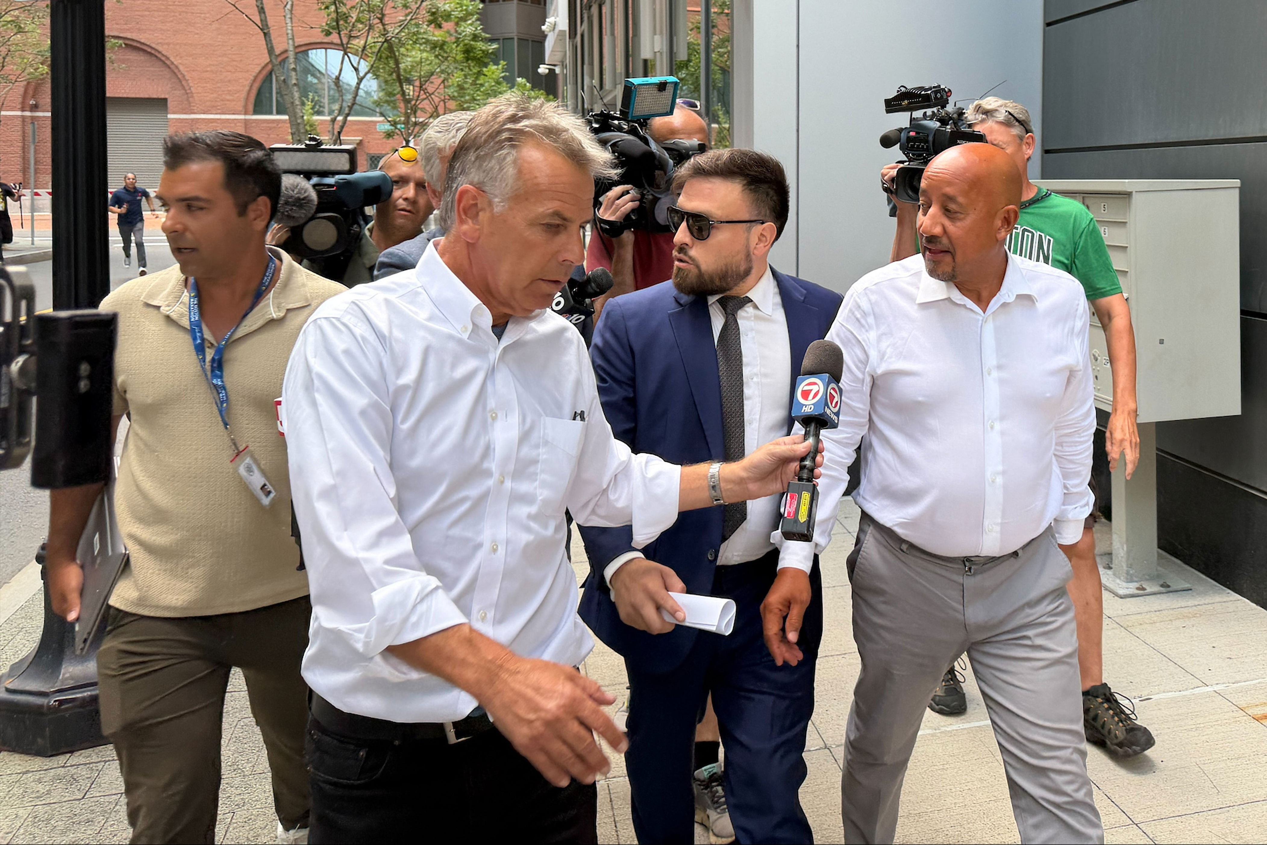 DePena was released after agreeing to several conditions, including turning over his passport and not seeking any loans without court approval (AP Photos/Michael Casey)