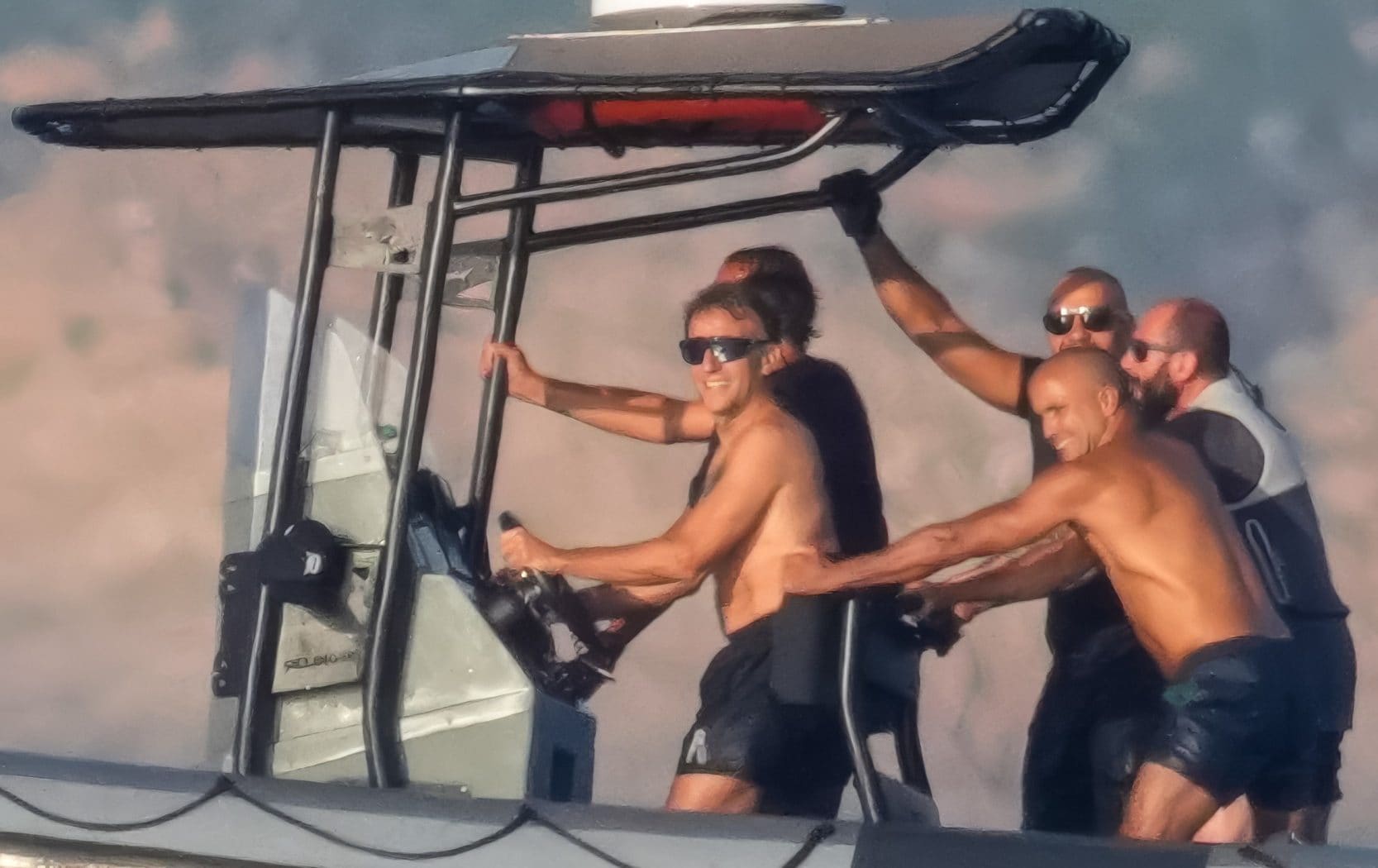 Mr Macron’s muscles and sunglasses were mocked by Left-winger Alexis Corbière - Backgrid UK